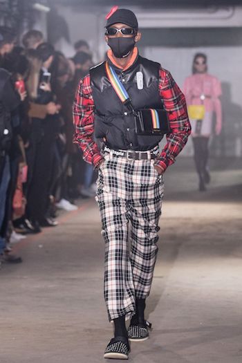 shoplifter chic wearing visible security tags Palm Angels menswear trends